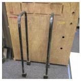 Metal firewood holder. Use 2 2x4s and adjust to