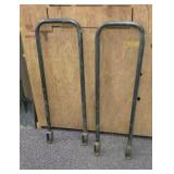 2 Metal firewood stands. Use 2 2x4s and adjust