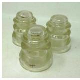 3 Vintage clear utility insulators.