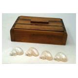 Wooden trinket box with sea shells.