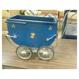 Antique baby buggy.