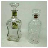 2 Clear glass decanters,