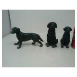 3 dog figures.