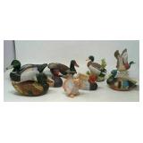 9 Figurines,  1 is a pipe holder.