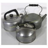 Three tea kettles