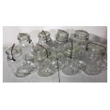 Eight mason jars with bails and glass lids