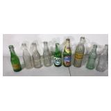 Nine collectible bottles