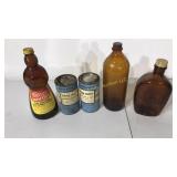 Collectible bottles and two containers