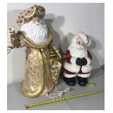 28 inch tall ceramic Santa has a broken hand,