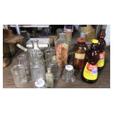 Several old bottles and jars