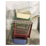 Several metal and plastic and wire baskets