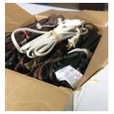 Box full of lamp cords