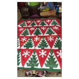 Hand quilted Christmas quilt is 49" x 54"