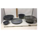 4 pieces of enamel cookware and 1 enamel cup.