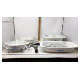 4 pieces of Corning Ware with 2 cradles, extra