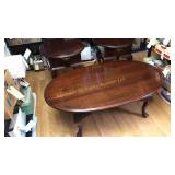 Coffee table and two end tables with drawers.