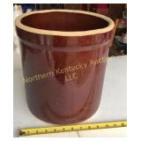 Solid brown crock is 10 1/2" dia x 11 1/2" tall