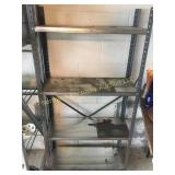 Metal 4 shelf unit. Measures 58"h x 30"w x 12"d.