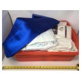 7" Deep tote of regular household linens.