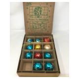 Box of vintage glass ornaments.