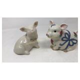 Two ceramic pigs