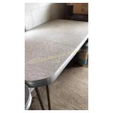 Vintage kitchen table with a leaf