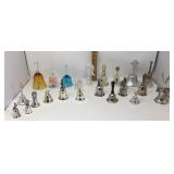 Silver, crystal, glass, ceramic and metal bells.