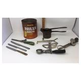 Old kitchen utensils and a Mills coffee can.  Old