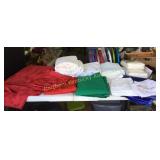 Christmas tablecloths, napkins, bedding, some new