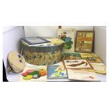 Hat box, children's books and cosmetic bag.