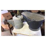 Galvanized metal watering can and coal bucket.