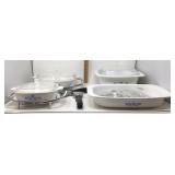 4 Pieces of Corning Ware with 2 cradles,