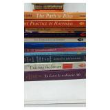 Assortment of paperback books.