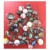 Marbles and 5 glass beads