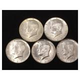 5 Silver clad Kennedy half dollars,