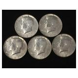 5 Silver clad Kennedy half dollars,