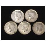 5 Silver clad Kennedy half dollars,