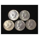 5 Silver clad Kennedy half dollars,