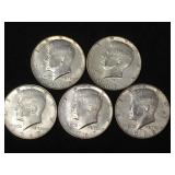 5 Silver clad Kennedy half dollars,