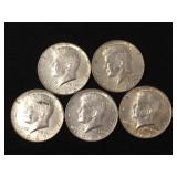 5 Silver clad Kennedy half dollars,