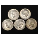 5 Silver clad Kennedy half dollars,