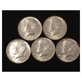 5 Silver clad Kennedy half dollars,