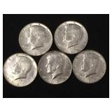 5 Silver clad Kennedy half dollars,