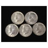 5 Silver clad Kennedy half dollars,