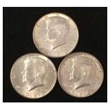 3 1964 Kennedy 90% silver half dollars.