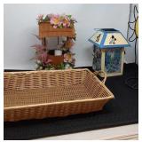 Decorative basket of home decor, some candle