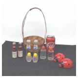 Decorative basket with salt and pepper shakers. 5