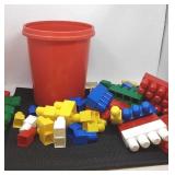 Tyco blocks in bucket.