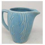 McCoy pottery blue pitcher. Crazing. Handle is