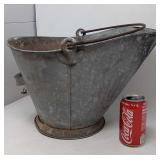 Galvanized coal bucket.